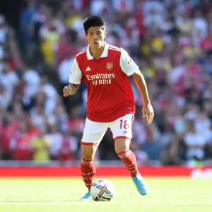 Arsenal's Tomiyasu in Action: Premier League 2022-23 - Arsenal vs. Leicester City Arsenal's Tomiyasu in Action: Premier League 2022-23 - Arsenal vs. Leicester City