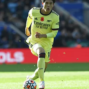 Arsenal's Tomiyasu in Action: Premier League Battle between Arsenal and Leicester City