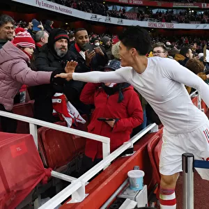 Arsenal's Tomiyasu Delights Fan with Shirt Present after Newcastle Victory