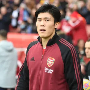 Arsenal's Tomiyasu Gears Up for Arsenal vs. Manchester City Showdown (Premier League 2021-22)