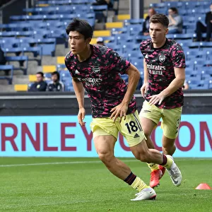 Arsenal's Tomiyasu Gears Up for Burnley Clash in Premier League (2021-22)