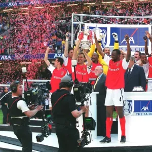 Arsenal's Tony Adams and Patrick Vieira Celebrate FA Cup Victory: Arsenal 2-0 Chelsea (AXA Final 2002, Millennium Stadium, Cardiff, Wales) Arsenal's Tony Adams and Patrick Vieira Celebrate FA Cup Victory: Arsenal 2-0 Chelsea (AXA Final 2002, Millennium Stadium, Cardiff, Wales)