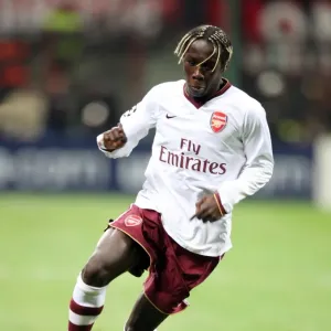 Arsenal's Triumph: Bacary Sagna Leads the Gunners to a 2-0 Victory over AC Milan in the UEFA Champions League (2008)