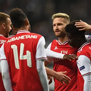 Arsenal's Triumph over Eintracht Frankfurt in Europa League: Mustafi Celebrates Third Goal