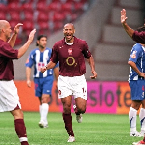 Arsenal's Triumph: Henry, Pires, Ljungberg Celebrate Win Against Porto at the Amsterdam Tournament (2005)