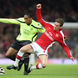 Arsenal's Triumph: Mark Randall's Dominance Over Wilson Palacios in the Carling Cup Clash (3-0)