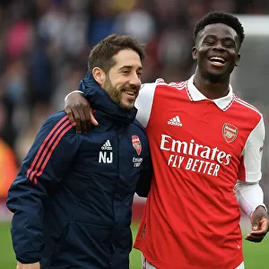 Arsenal's Triumph: Nico Jover and Bukayo Saka Celebrate in the Premier League 2022-23
