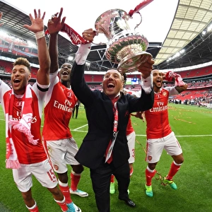 Arsenal's Triumph: Oxlade-Chamberlain, Welbeck, and Cazorla Celebrate FA Cup Victory