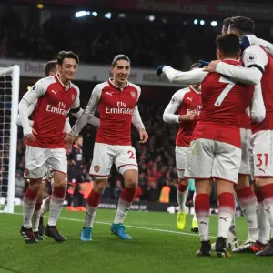 Arsenal's Triumph: Ozil, Sanchez, Bellerin in Glory - Celebrating a Memorable Win over Huddersfield Town Arsenal's Triumph: Ozil, Sanchez, Bellerin in Glory - Celebrating a Memorable Win over Huddersfield Town
