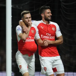 Arsenal's Triumph: Ramsey and Giroud Celebrate Goal Scoring Feats Against Watford (2015/16)