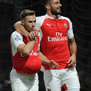 Arsenal's Triumph: Ramsey and Giroud Celebrate Goals Against Watford (2015/16)