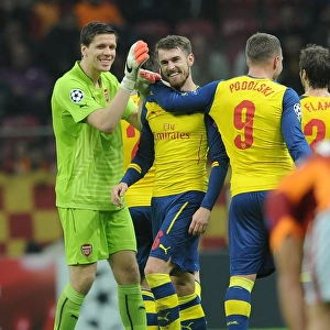 Arsenal's Triumph: Ramsey, Podolski, Szczesny Celebrate Goals Against Galatasaray in Champions League