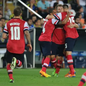 Arsenal's Triumph: Ramsey, Wilshere, Walcott Celebrate Goals Against Fenerbahce in Champions League Play-offs