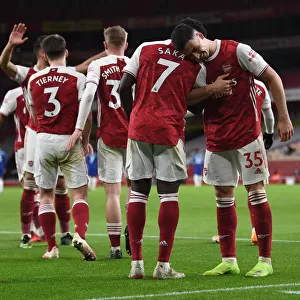 Arsenal's Triumph: Saka and Martinelli Celebrate Goals Against Chelsea (Premier League 2020-21)