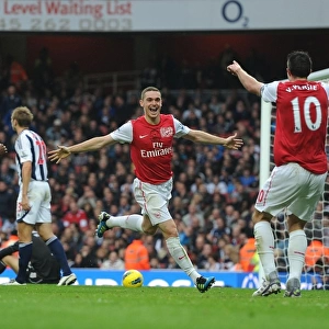 Arsenal's Triumph: Vermaelen, Van Persie, and Gervinho Celebrate Goals Against West Bromwich Albion (2011-12)