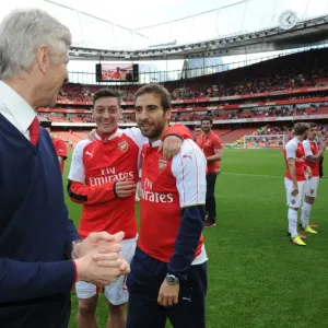 Arsenal's Triumph: Wenger, Ozil, and Flamini Celebrate Victory Over Aston Villa (2015-16) Arsenal's Triumph: Wenger, Ozil, and Flamini Celebrate Victory Over Aston Villa (2015-16)