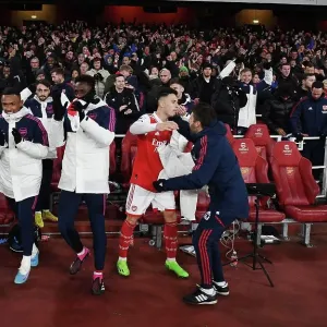 Arsenal's Triumphant Bench: Celebrating a Hard-Fought Victory Over Manchester United (2022-23)