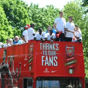 Arsenal's Triumphant Parade with the 2014 Trophy in Islington Arsenal's Triumphant Parade with the 2014 Trophy in Islington