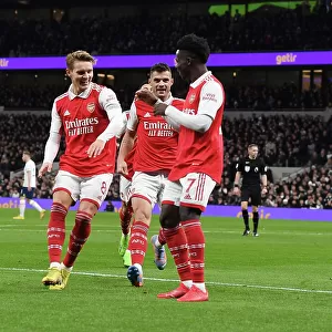 Arsenal's Triumphant Start to 2023: Saka, Odegaard, Xhaka Celebrate First Goals in Thrilling Tottenham Victory