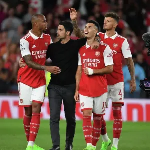 Arsenal's Triumphant Team: Arteta, Gabriel, Martinelli, and Ben White Celebrate Victory over Aston Villa (2022-23) Arsenal's Triumphant Team: Arteta, Gabriel, Martinelli, and Ben White Celebrate Victory over Aston Villa (2022-23)