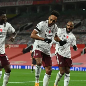 Arsenal's Triumphant Three: Aubameyang, Partey, Lacazette Celebrate Goal at Empty Old Trafford (2020-21) Arsenal's Triumphant Three: Aubameyang, Partey, Lacazette Celebrate Goal at Empty Old Trafford (2020-21)