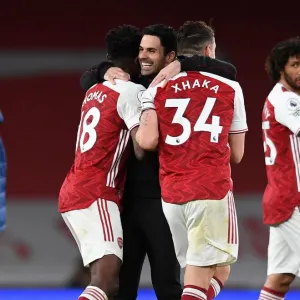 Arsenal's Triumphant Threesome: Arteta, Partey, and Xhaka Celebrate Premier League Victory over Tottenham