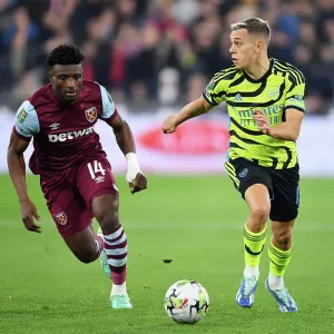 Arsenal's Trossard Battles Past West Ham Print Arsenal's Trossard Battles Past West Ham Print