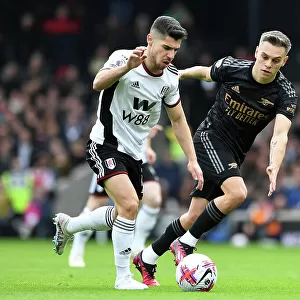 Arsenal's Trossard Closes In on Fulham's Solomon in Premier League Clash