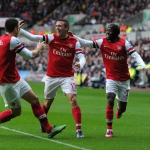 Arsenal's Unforgettable First Goal: Monreal, Giroud, and Gervinho Celebrate at Swansea City (2012-13) Arsenal's Unforgettable First Goal: Monreal, Giroud, and Gervinho Celebrate at Swansea City (2012-13)