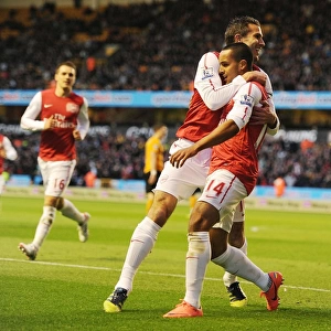 Arsenal's Unforgettable Victory: Walcott-van Persie's Dazzling Goal Celebration at Wolverhampton Wanderers, 2011-12 Premier League