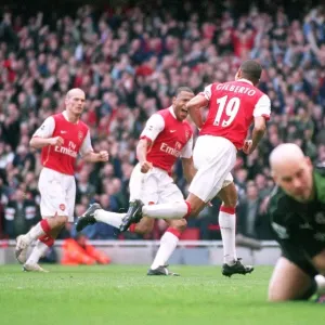 Arsenal's Unforgettable Victory: Gilberto and Baptista's Goal Celebration (2:1 vs Reading, FA Premiership, Emirates Stadium, 3/3/07) Arsenal's Unforgettable Victory: Gilberto and Baptista's Goal Celebration (2:1 vs Reading, FA Premiership, Emirates Stadium, 3/3/07)