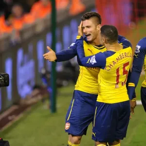 Arsenal's Unstoppable Duo: Giroud and Oxlade-Chamberlain in Glory: Celebrating Goals Against Liverpool (2014/15) Arsenal's Unstoppable Duo: Giroud and Oxlade-Chamberlain in Glory: Celebrating Goals Against Liverpool (2014/15)