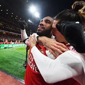 Arsenal's Unstoppable Duo: Lacazette and Bellerin Celebrate Goal Against Liverpool