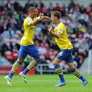 Arsenal's Unstoppable Duo: Ramsey and Gibbs Celebrate Goals Against Sunderland (2013-14) Arsenal's Unstoppable Duo: Ramsey and Gibbs Celebrate Goals Against Sunderland (2013-14)