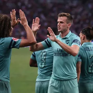 Arsenal's Unstoppable Moment: Holding and Guendouzi Celebrate Goal Against Paris Saint-Germain Arsenal's Unstoppable Moment: Holding and Guendouzi Celebrate Goal Against Paris Saint-Germain