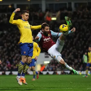 Arsenal's Vermaelen Clashes with West Ham's Rat in Premier League Showdown