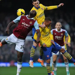 Arsenal's Vermaelen and Gibbs Clash with West Ham's Cole in Premier League Battle