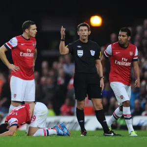 Arsenal's Vermaelen Protests Referee Decision Against Norwich (2012-13) Arsenal's Vermaelen Protests Referee Decision Against Norwich (2012-13)