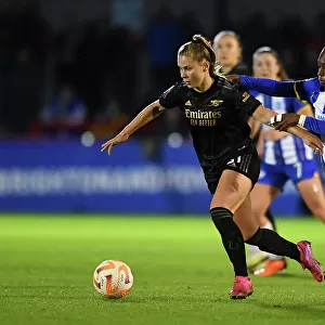 Arsenal's Victoria Pelova Faces Pressure from Brighton's Danielle Carter in FA Women's Super League Clash