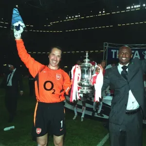 Arsenal's Victorious Captains: Lifting the FA Cup after a 1-0 Win over Southampton (The Millennium Stadium, Cardiff, 2003) Arsenal's Victorious Captains: Lifting the FA Cup after a 1-0 Win over Southampton (The Millennium Stadium, Cardiff, 2003)