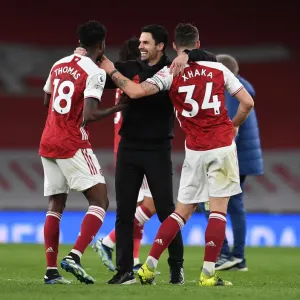Arsenal's Victory: Arteta Celebrates with Partey and Xhaka