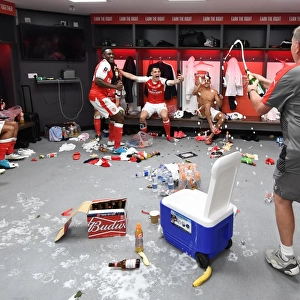 Arsenal's Victory Celebration: Vic Akers Sprays Champagne on Danny Welbeck and Granit Xhaka (FA Cup Final 2017)
