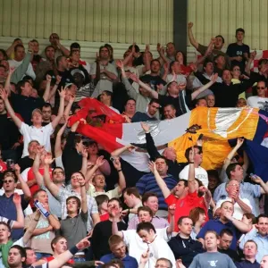 Arsenal's Victory: Fans Celebrate at White Hart Lane, 2004