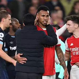 Arsenal's Victory: Mikel Arteta Consoles Gabriel after Arsenal v West Ham United (2021-22)