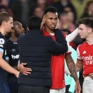 Arsenal's Victory: Mikel Arteta Consoles Gabriel after Arsenal v West Ham United (2021-22) Arsenal's Victory: Mikel Arteta Consoles Gabriel after Arsenal v West Ham United (2021-22)