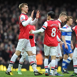 Arsenal's Victory: Mikel Arteta and Team Celebrate Four Goals Against Reading (2013)