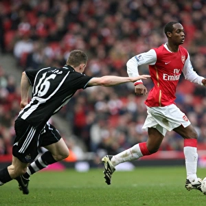 Arsenal's Victory Over Newcastle United: Justin Hoyte and James Milner Clash in the FA Cup Fourth Round, 2008