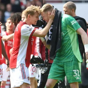 Arsenal's Victory: Ramsdale and Odegaard Celebrate Over Manchester United Arsenal's Victory: Ramsdale and Odegaard Celebrate Over Manchester United