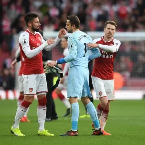 Arsenal's Victory: Ramsey and Giroud Celebrate with Former Teams Goalkeeper Fabianski Arsenal's Victory: Ramsey and Giroud Celebrate with Former Teams Goalkeeper Fabianski