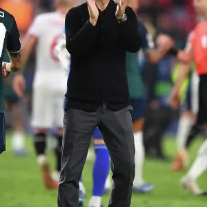Arsenal's Victory in Sevilla: Mikel Arteta Celebrates in the UEFA Champions League 2023/24 Arsenal's Victory in Sevilla: Mikel Arteta Celebrates in the UEFA Champions League 2023/24